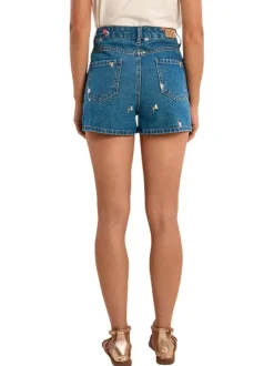 Short en coton indigo pourvu de motifs floraux brodés et de multiples poches