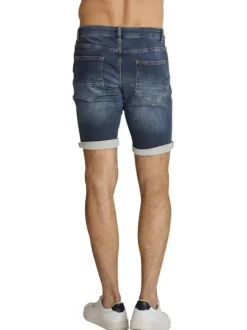 Short en coton indigo à revers pourvu de coutures contrastées