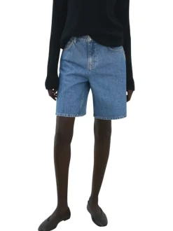 Short en coton indigo uni pourvu de passants pour la ceinture