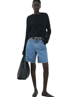 Short en coton indigo uni pourvu de passants pour la ceinture