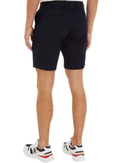 Short en coton marine uni avec une coupe chino et des poches latérales