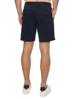 Short en coton marine uni avec une coupe chino et des poches latérales