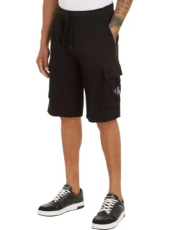 Short en coton noir uni avec une ceinture élastiquée et une coupe cargo