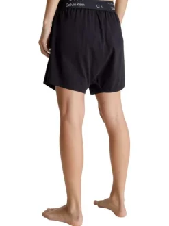 Short en coton noir uni avec une coupe droite et logo de la marque