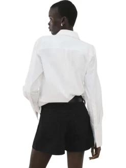 Short en coton noir uni pourvu de passants pour la ceinture