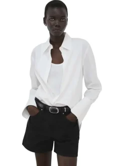 Short en coton noir uni pourvu de passants pour la ceinture