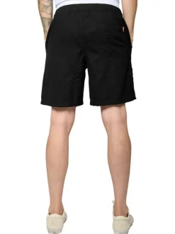 Short en coton noir uni à texture piquée avec une coupe droite et des poches