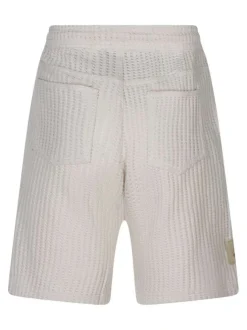 Short jogging en coton mélangé écru uni avec une coupe droite