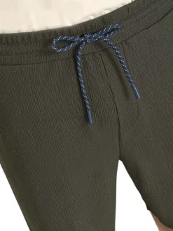 Short jogging kaki uni coupe droite et une taille élastiquée