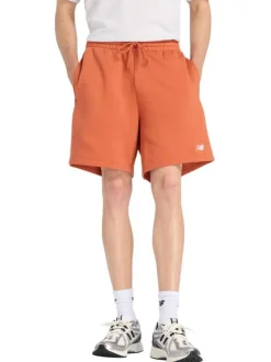 Short jogging orange uni avec une coupe droite et une taille élastique