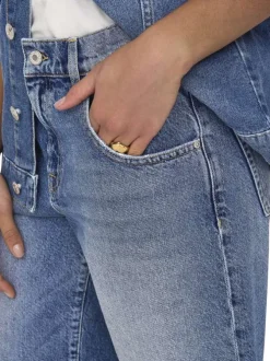 Short long en coton bleu uni avec une coupe large à zip et à bouton