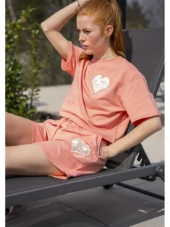 Short rose en jogging à coupe droite avec 3 poches et coeur blanc brodé