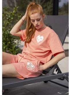 Short rose en jogging à coupe droite avec 3 poches et coeur blanc brodé