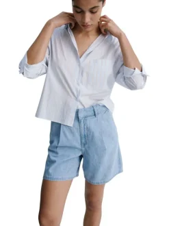 Short stone uni avec une coupe droite et des crochets en fermeture
