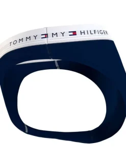 Slip bleu marine uni avec une ceinture élastiquée et logo de la marque