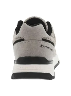 Sneakers beiges en maille avec des détails noirs et à lacets ronds