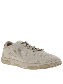 Sneakers beiges à semelle plate avec une fermeture à lacets ronds