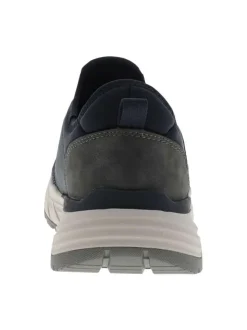 Sneakers bleu marine avec un talon plat et fermeture à slip-on