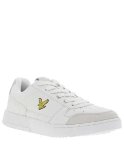 Sneakers en cuir blanc et empiècements beige à logo jaune débossé et lacets