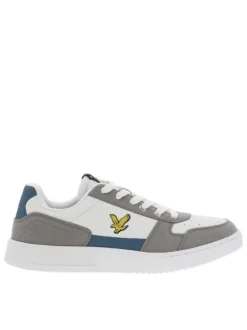 Sneakers en cuir blanc à logo siliconé jaune débossé à l'extérieur de la tige