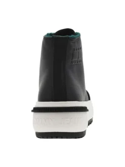 Sneakers fourrées, en cuir noir, à tige montante à semelle plateforme semi-compensée
