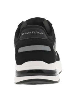 Sneakers monochromes noires à doublure néoprène, semelle semi-compensée blanche