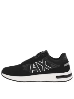 Sneakers monochromes noires à doublure néoprène, semelle semi-compensée blanche