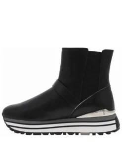 Sneakers montantes en cuir brillant noir à semelle running compensée et soufflets élastiqués