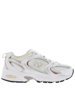 Sneakers multisport blanches et argentées à talon plat et à lacets blancs
