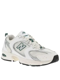 Sneakers multisport blanches à talon plat et à lacets avec détails verts