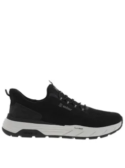 Sneakers noires à semelle plate avec une fermeture à slip-on