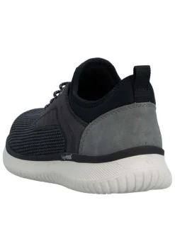Sneakers noires à talon plat avec une languette d'aisance à l'arrière