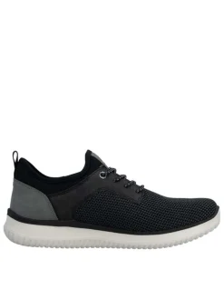 Sneakers noires à talon plat avec une languette d'aisance à l'arrière