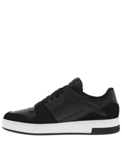 Sneakers tennis en cuir noir à semelle blanche semi-compensée et lacets plats