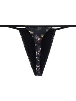 String noir fleuri avec une coupe moulante et une taille élastiquée