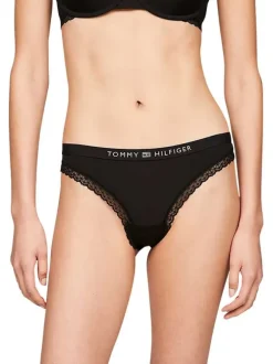 String noir uni avec de la dentelle et une taille élastiquée au nom de la marque
