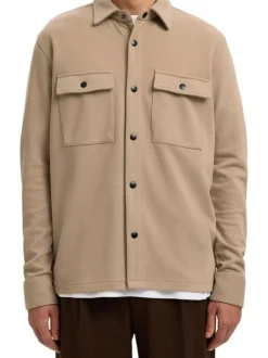 Surchemise beige uni avec un col boutonné et des manches longues