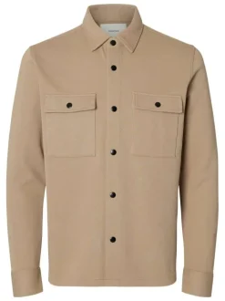 Surchemise beige uni avec un col boutonné et des manches longues