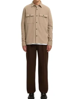 Surchemise beige uni avec un col boutonné et des manches longues