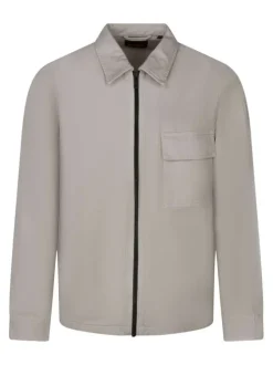 Surchemise en coton beige uni avec une coupe oversize et un col à revers