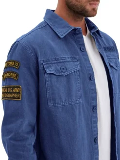 Surchemise en coton bleue marine uni à coupe regular fit avec des poches