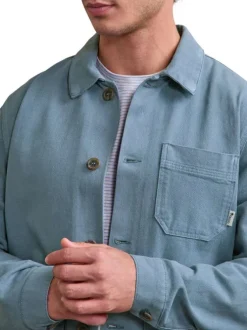 Surchemise en coton bleue unie avec une coupe droite et un col français