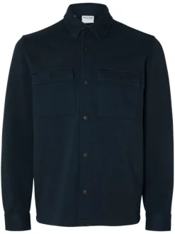 Surchemise marine uni avec un col boutonné et des manches longues