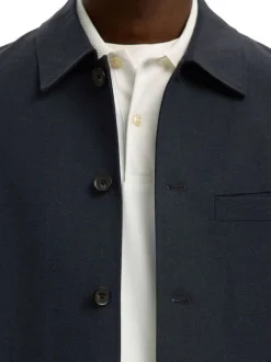 Surchemise marine uni avec une coupe ajustée et des manches longues