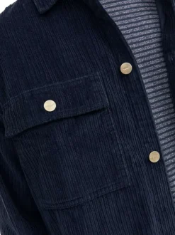 Surchemise marine unie avec une coupe droite et des manches longues