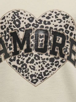 Sweat beige à imprimé léopard avec une coupe droite, col rond et manches longues