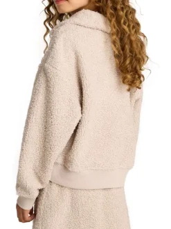 Sweat beige sherpa à coupe droite avec col à revers, manches longues et logo