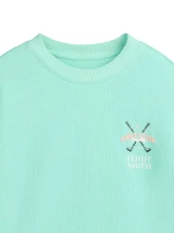 Sweat en coton vert à coupe droite pourvu d'un col rond côtelé