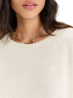 Sweat beige en maille jersey avec une coupe droite et un col rond