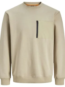 Sweat beige uni à coupe droite et à col rond avec une poche zippée à la poitrine